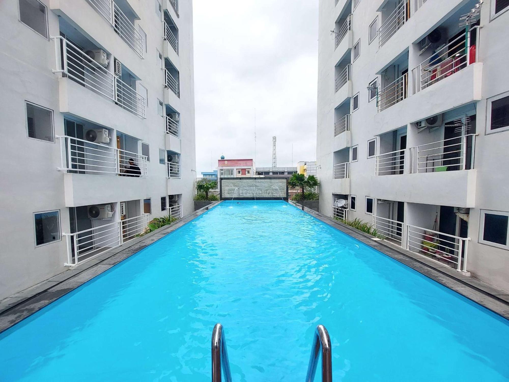 Homey And Warm At Mansyur By Travelio Apartemen Medan